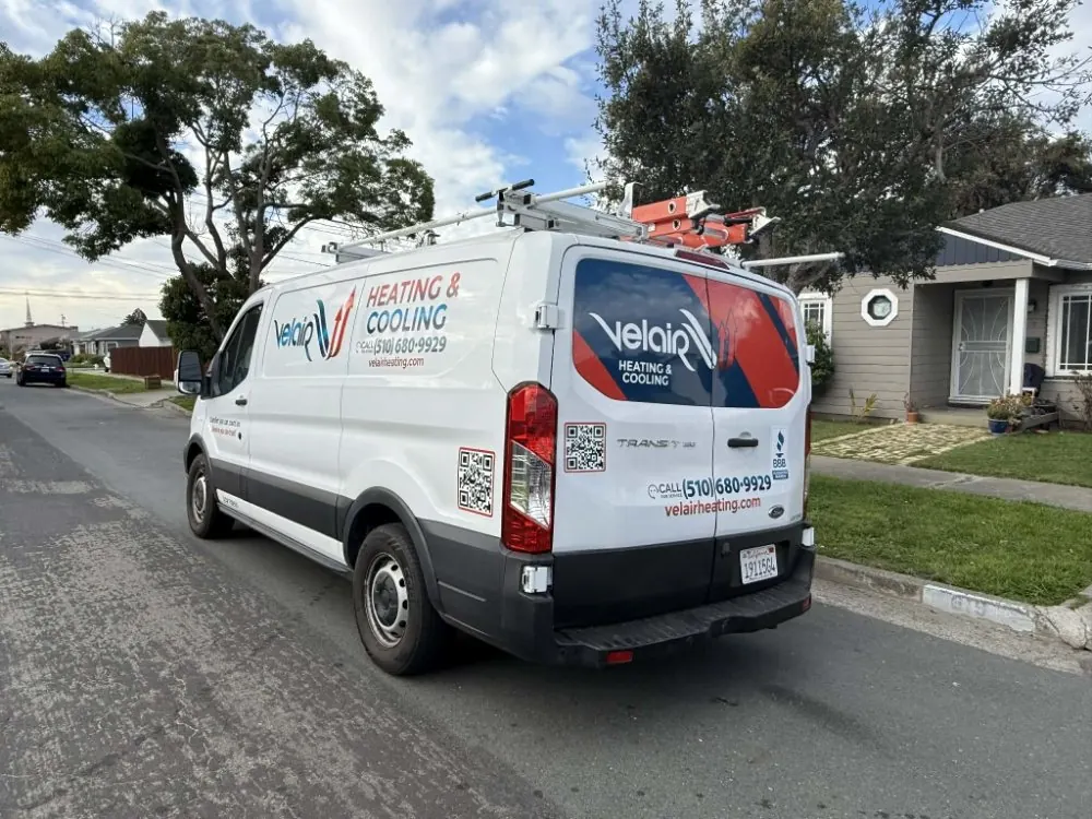 The Velair van parked on a residential street.